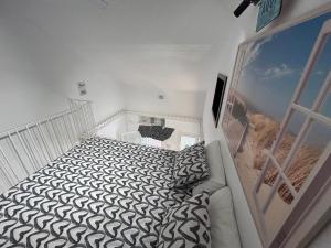 A bed or beds in a room at Carihuela Home