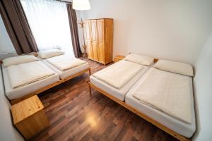 Posteľ alebo postele v izbe v ubytovaní Apartmány Olešnice