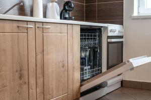 Kuchyňa alebo kuchynka v ubytovaní Apartmány Olešnice