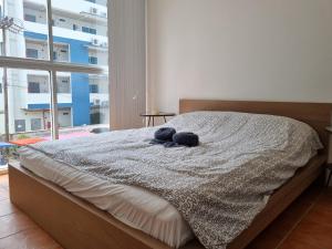 Giường trong phòng chung tại Avatara B condominium Family room B25 +37 ảnh