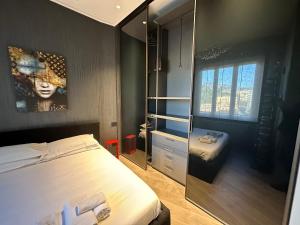 Säng eller sängar i ett rum på Luxury Sea View - Genoa