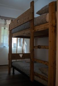 a couple of bunk beds in a room at Borgo Don Camillo in Cutigliano