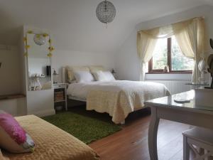 Postel nebo postele na pokoji v ubytování Cherrytree House B&B