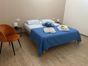Postel nebo postele na pokoji v ubytování Caramel House & Villa