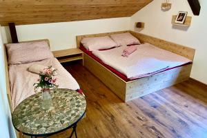 Tempat tidur dalam kamar di VLADIMÍR, rekreační středisko