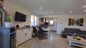 Kuchyň nebo kuchyňský kout v ubytování Premiumhaus DeLuchs + 20 fotografií