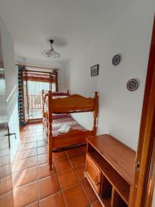 Двох'ярусне ліжко або двоярусні ліжка в номері Casa Rural La Argentina