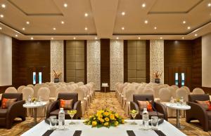 a conference room with rows of chairs and tables at Fortune Park Dahej - Member ITC Hotels' Group in Dahej