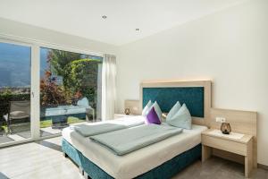 Ένα ή περισσότερα κρεβάτια σε δωμάτιο στο Weinreichhof Apartment Marie & Max