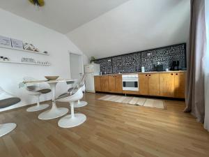 Kuchyň nebo kuchyňský kout v ubytování Apartman Magnolia