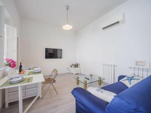 TV a/nebo společenská místnost v ubytování Holiday Home Libeccio by Interhome