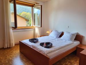 Säng eller sängar i ett rum på Apartment Casa Nora by Interhome
