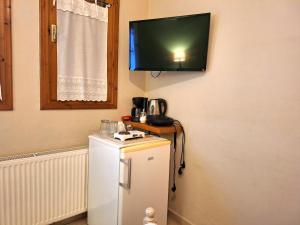 Kuchyňa alebo kuchynka v ubytovaní Skourgias Rooms