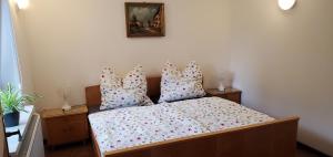 Postel nebo postele na pokoji v ubytování Haus Oderbruch