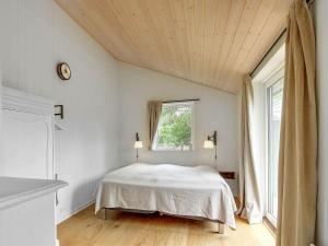 En eller flere senge i et værelse på Holiday Home Aleko - 2-5km from the sea in Western Jutland by Interhome