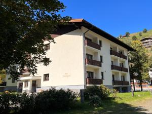 a building with balconies on the side of it at Apartment Flachgau by Interhome in Saalbach-Hinterglemm