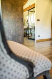 a close up of a shoe sitting on a chair in a room at Fagoaga dorretxea in Ergoyen