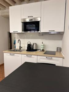 Η κουζίνα ή μικρή κουζίνα στο casa corso corsi 1 piano