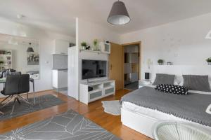 TV a/nebo společenská místnost v ubytování Sweet Escape