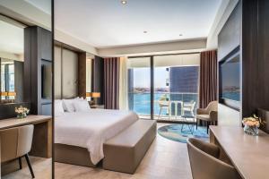 Postel nebo postele na pokoji v ubytování Barceló Fortina Malta