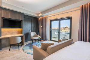 Postel nebo postele na pokoji v ubytování Barceló Fortina Malta