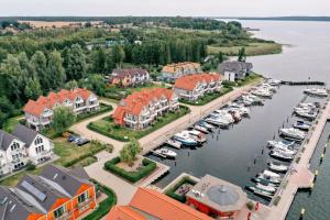 an aerial view of a marina with boats in the water at Becci's Apartment P6A8 in Plau am See