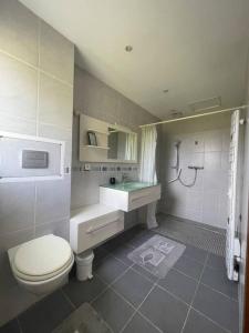 Een badkamer bij Charmante maison en pierre