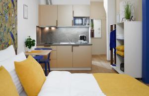 Kuchyňa alebo kuchynka v ubytovaní City Nest Apartments by Adrez