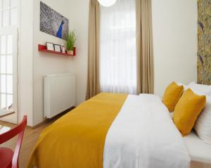 Posteľ alebo postele v izbe v ubytovaní City Nest Apartments by Adrez