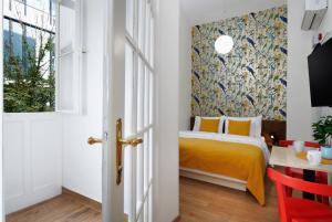 Posteľ alebo postele v izbe v ubytovaní City Nest Apartments by Adrez