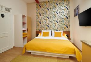Posteľ alebo postele v izbe v ubytovaní City Nest Apartments by Adrez