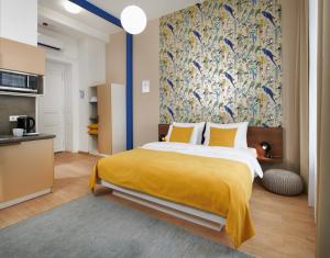 Posteľ alebo postele v izbe v ubytovaní City Nest Apartments by Adrez
