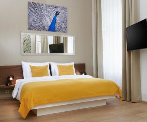 Posteľ alebo postele v izbe v ubytovaní City Nest Apartments by Adrez