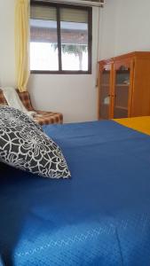 Postel nebo postele na pokoji v ubytování FRANLAU PLAYA