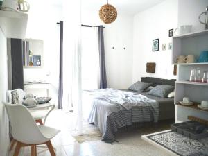 Ένα ή περισσότερα κρεβάτια σε δωμάτιο στο Olympian-Apartments 