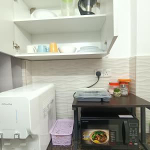 Кухня або міні-кухня у Canal 181 Deluxe Room Stay Kota Bharu