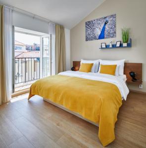 Posteľ alebo postele v izbe v ubytovaní City Nest Apartments by Adrez