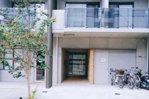 a group of bikes parked in front of a building at REST COLLECTION Kujo Osaka in Osaka +48 photos