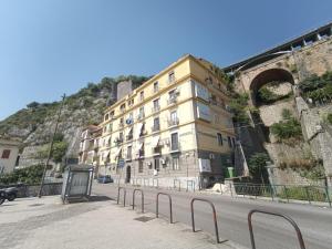 a large building on the side of a street at Mamma Rosa Be Home in Salerno