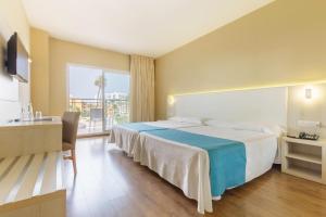 Postel nebo postele na pokoji v ubytování Hotel Best Siroco