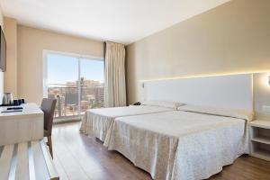 Postel nebo postele na pokoji v ubytování Hotel Best Siroco