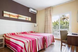 Postel nebo postele na pokoji v ubytování Hotel Best Siroco