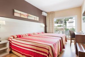 Postel nebo postele na pokoji v ubytování Hotel Best Siroco