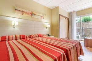 Postel nebo postele na pokoji v ubytování Hotel Best Siroco