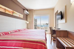 Postel nebo postele na pokoji v ubytování Hotel Best Siroco