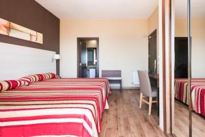 Postel nebo postele na pokoji v ubytování Hotel Best Siroco