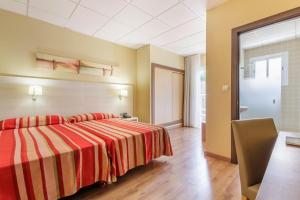 Postel nebo postele na pokoji v ubytování Hotel Best Siroco