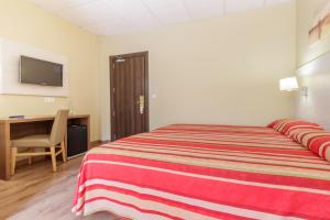 Postel nebo postele na pokoji v ubytování Hotel Best Siroco