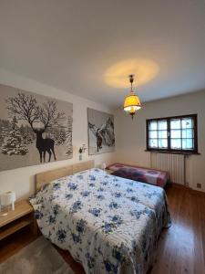 Säng eller sängar i ett rum på Casalta by Go New Location