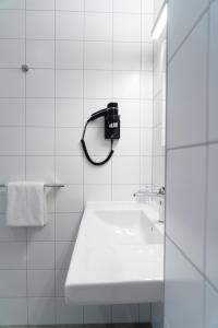 ibis Bulle - La Gruyère Swiss Bike Hotel的一间浴室